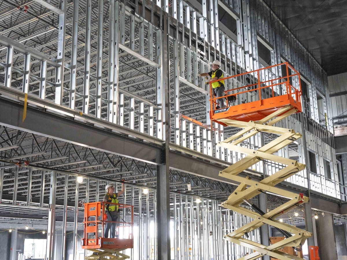 JLG enhances electric slab scissors, vertical lifts and stock-pickers